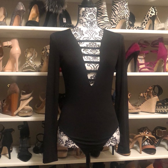 Tops - Sexy black low cut body suite in black